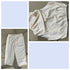 White pants shown from different angles on a neutral background