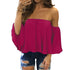 Woman wearing a pink off-shoulder top with bell sleeves on a white background