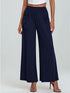Navy wide-leg pants worn by a person on a white background