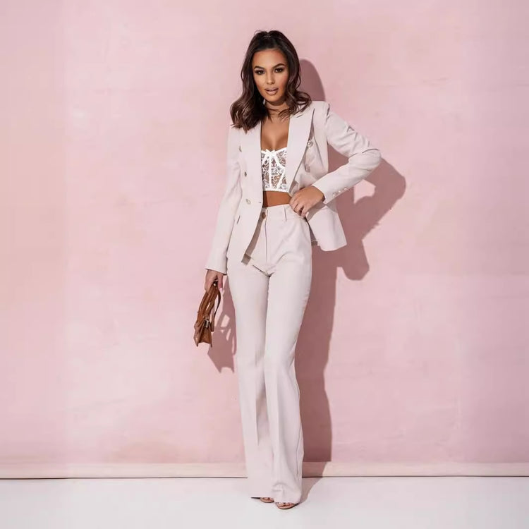 Woman in a white outfit with a pink background