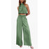 Green two-piece outfit with a halter top and wide-leg pants on a white background