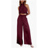 Burgundy two-piece outfit with a halter top and wide-leg pants on a white background