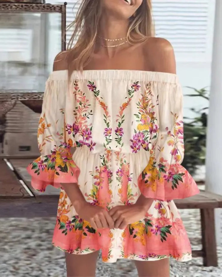 Woman wearing a floral off-shoulder dress with a blurred outdoor background