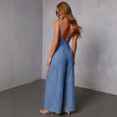 Chic Light Blue Denim Jumpsuit with Open Back and Zipper Detail - Lifestil