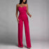 Pink strapless jumpsuit on a gray background