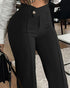Black pants worn by a person in an indoor setting