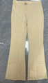 Beige pants on a dark marble surface